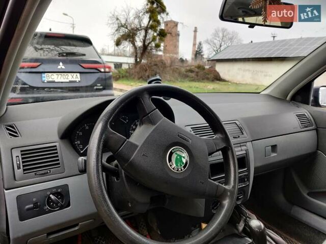 Черный Шкода Фабия, объемом двигателя 1.39 л и пробегом 248 тыс. км за 3500 $, фото 5 на Automoto.ua