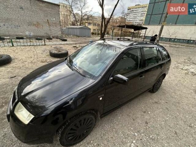 Черный Шкода Фабия, объемом двигателя 1.39 л и пробегом 220 тыс. км за 4800 $, фото 4 на Automoto.ua