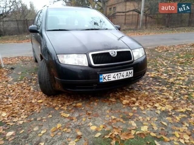 Черный Шкода Фабия, объемом двигателя 1.39 л и пробегом 220 тыс. км за 4800 $, фото 3 на Automoto.ua