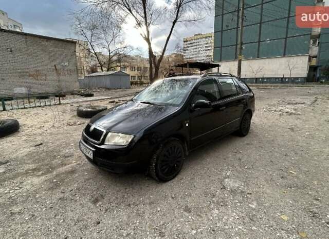 Черный Шкода Фабия, объемом двигателя 1.39 л и пробегом 220 тыс. км за 4800 $, фото 2 на Automoto.ua
