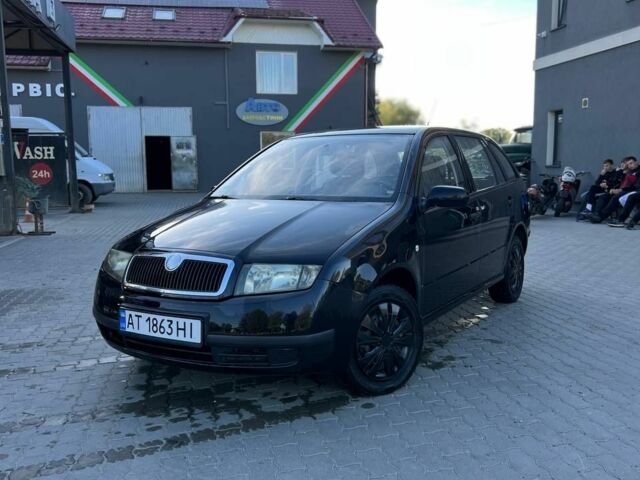 Черный Шкода Фабия, объемом двигателя 1.2 л и пробегом 290 тыс. км за 2500 $, фото 4 на Automoto.ua
