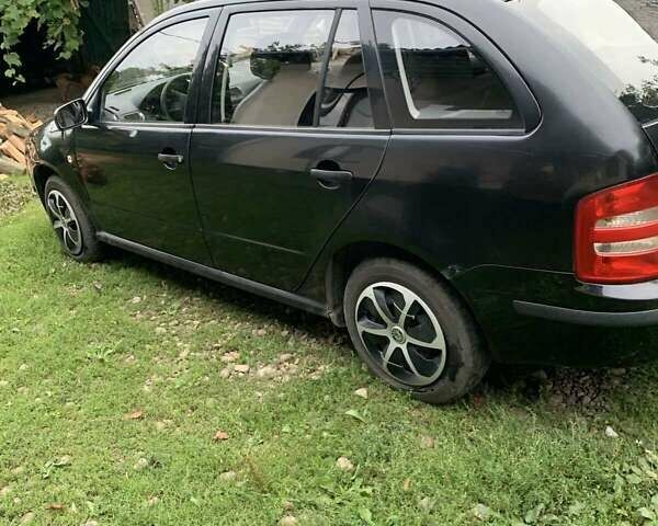 Черный Шкода Фабия, объемом двигателя 1.39 л и пробегом 264 тыс. км за 3600 $, фото 5 на Automoto.ua