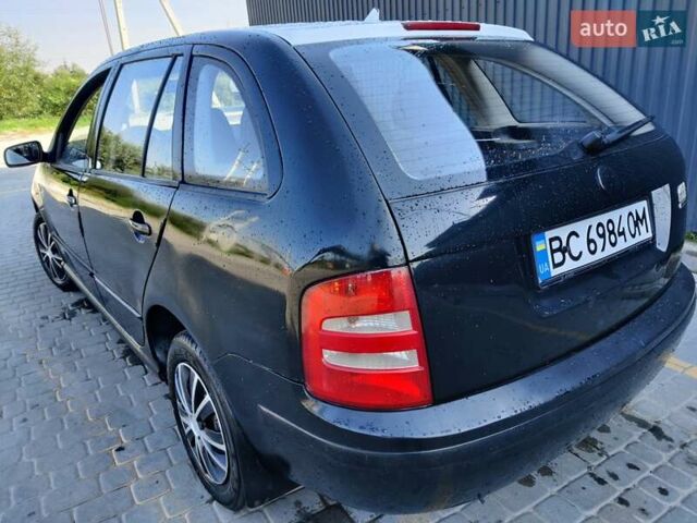 Черный Шкода Фабия, объемом двигателя 1.39 л и пробегом 248 тыс. км за 3500 $, фото 7 на Automoto.ua