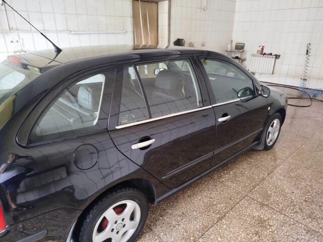 Чорний Шкода Фабія, об'ємом двигуна 1.4 л та пробігом 213 тис. км за 3999 $, фото 11 на Automoto.ua