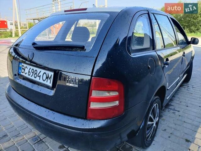 Черный Шкода Фабия, объемом двигателя 1.39 л и пробегом 248 тыс. км за 3500 $, фото 6 на Automoto.ua