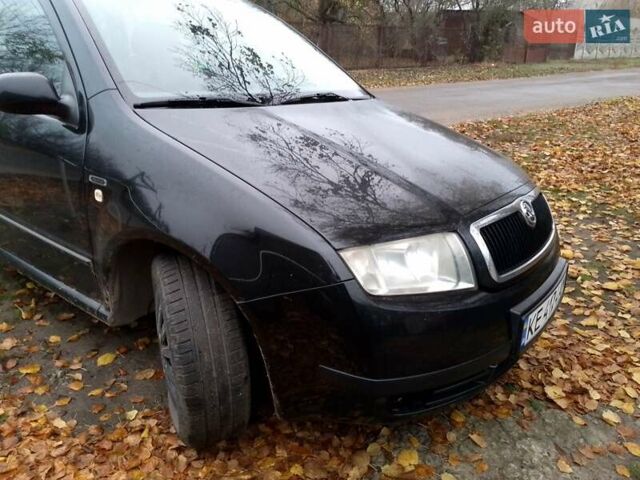 Черный Шкода Фабия, объемом двигателя 1.39 л и пробегом 220 тыс. км за 4800 $, фото 1 на Automoto.ua