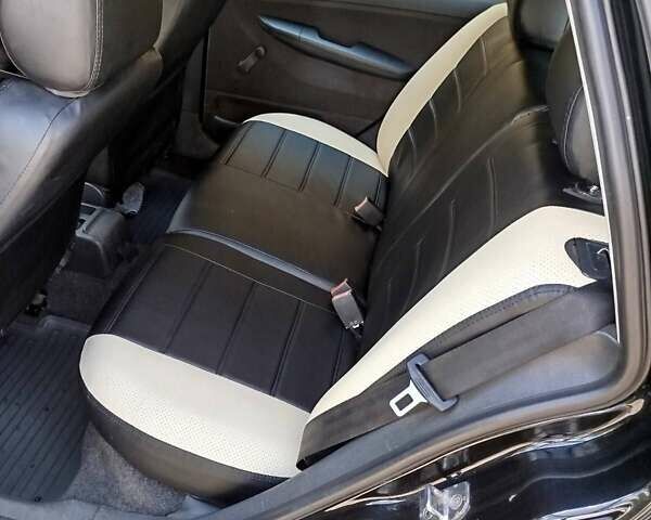 Черный Шкода Фабия, объемом двигателя 1.4 л и пробегом 213 тыс. км за 3999 $, фото 6 на Automoto.ua