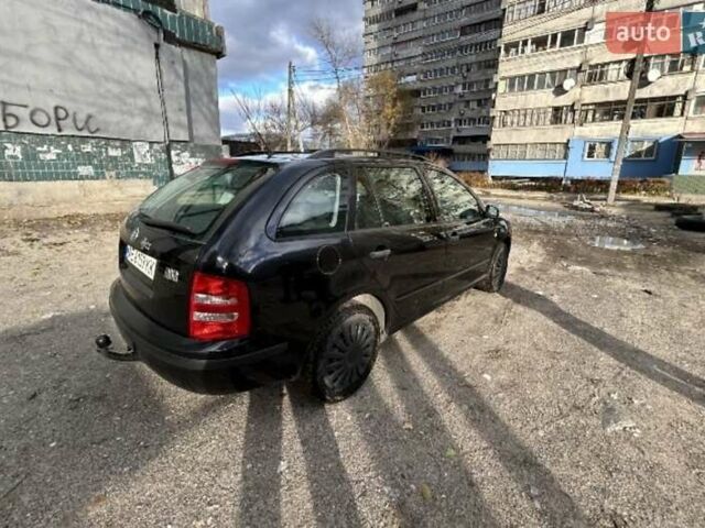 Черный Шкода Фабия, объемом двигателя 1.39 л и пробегом 220 тыс. км за 4800 $, фото 5 на Automoto.ua