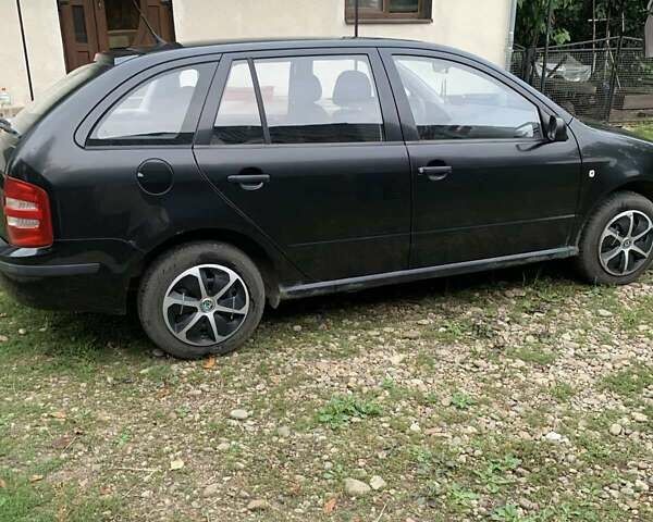 Черный Шкода Фабия, объемом двигателя 1.39 л и пробегом 264 тыс. км за 3600 $, фото 2 на Automoto.ua