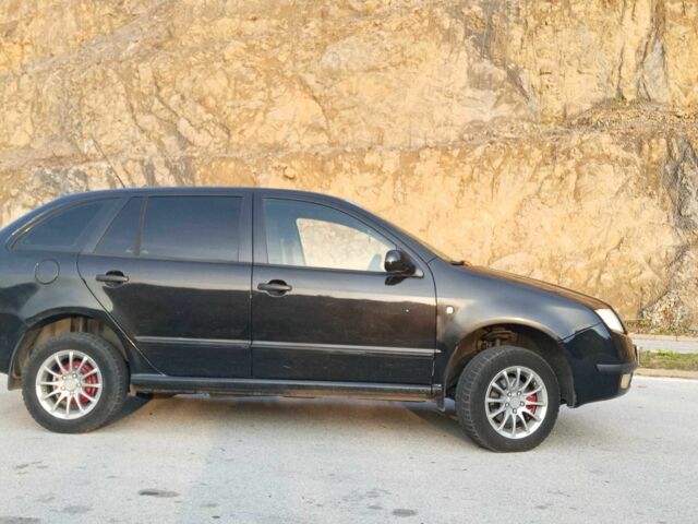 Черный Шкода Фабия, объемом двигателя 1.2 л и пробегом 300 тыс. км за 4350 $, фото 19 на Automoto.ua