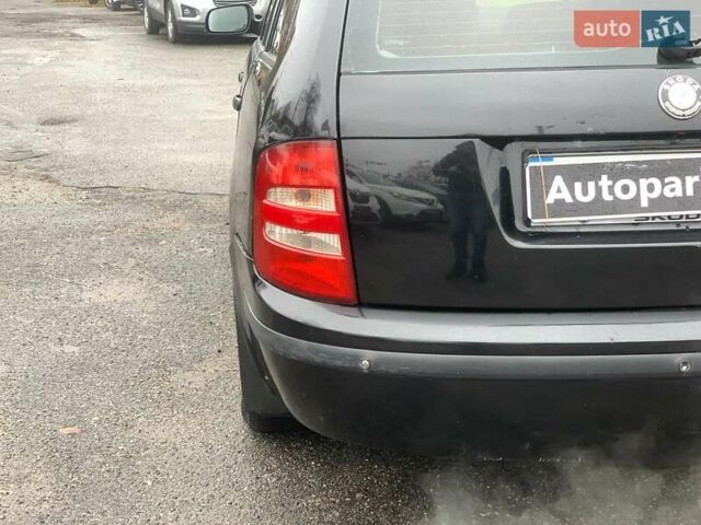 Черный Шкода Фабия, объемом двигателя 1.4 л и пробегом 308 тыс. км за 3390 $, фото 11 на Automoto.ua