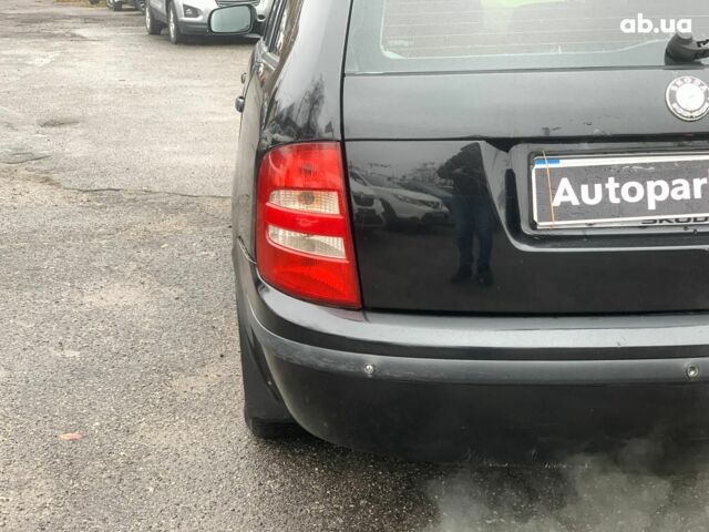 Черный Шкода Фабия, объемом двигателя 1.4 л и пробегом 308 тыс. км за 3390 $, фото 11 на Automoto.ua