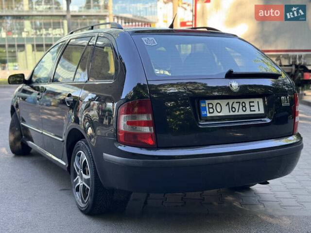 Черный Шкода Фабия, объемом двигателя 1.39 л и пробегом 255 тыс. км за 3750 $, фото 5 на Automoto.ua