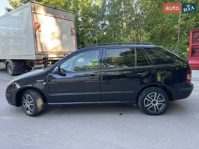 Черный Шкода Фабия, объемом двигателя 1.39 л и пробегом 255 тыс. км за 3750 $, фото 12 на Automoto.ua