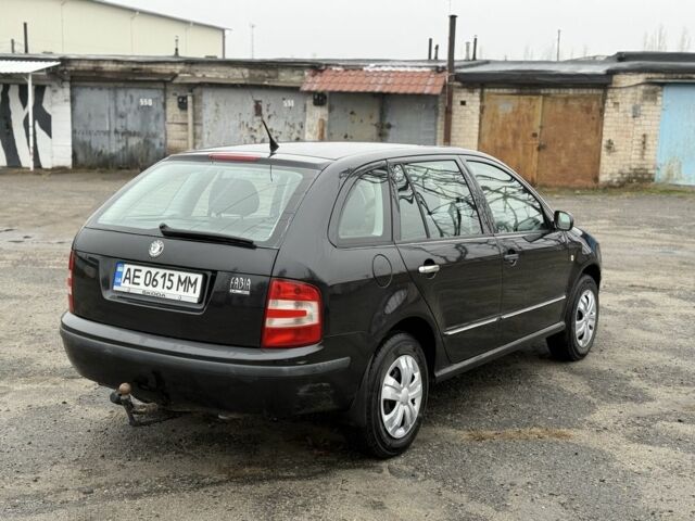 Черный Шкода Фабия, объемом двигателя 1.4 л и пробегом 233 тыс. км за 3800 $, фото 2 на Automoto.ua
