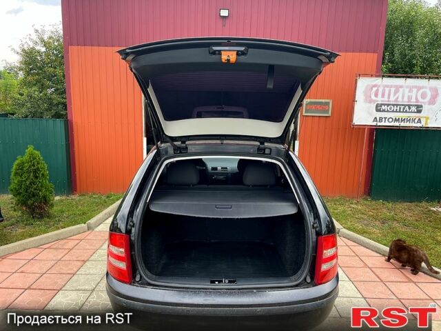 Черный Шкода Фабия, объемом двигателя 1.4 л и пробегом 186 тыс. км за 4100 $, фото 4 на Automoto.ua