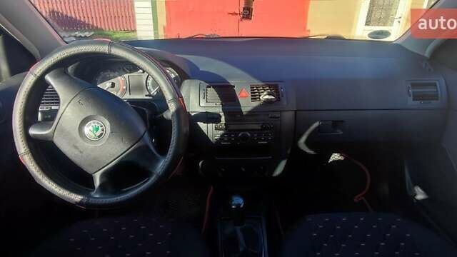 Черный Шкода Фабия, объемом двигателя 1.4 л и пробегом 387 тыс. км за 3500 $, фото 9 на Automoto.ua