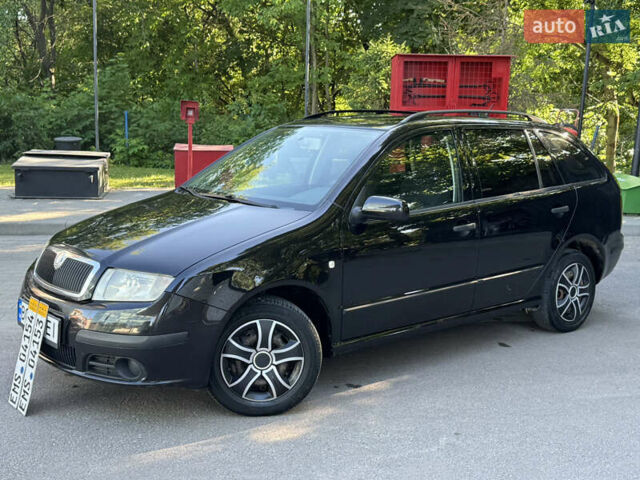 Черный Шкода Фабия, объемом двигателя 1.39 л и пробегом 255 тыс. км за 3750 $, фото 2 на Automoto.ua