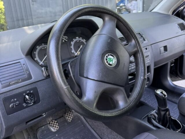 Шкода Фабия 2004 в Тернополе на Automoto.ua Черный Шкода Фабия, объемом двигателя 1.4 л и пробегом 261 тыс. км за 3950 $, фото 13 на Automoto.ua