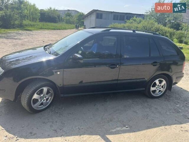 Черный Шкода Фабия, объемом двигателя 1.39 л и пробегом 226 тыс. км за 4600 $, фото 4 на Automoto.ua