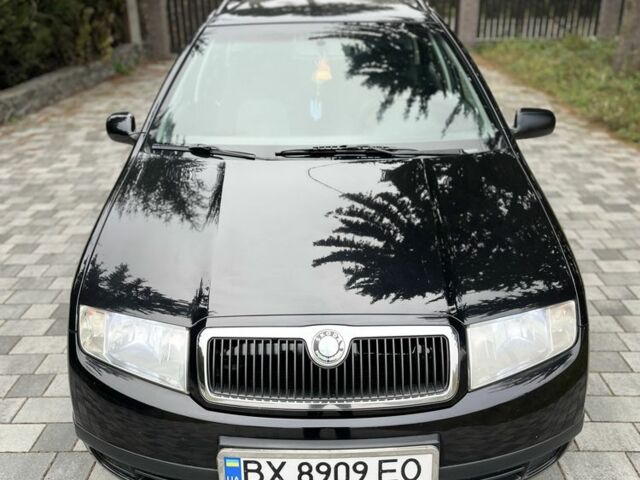 Черный Шкода Фабия, объемом двигателя 1.4 л и пробегом 230 тыс. км за 3999 $, фото 2 на Automoto.ua