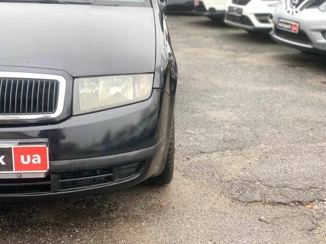 Черный Шкода Фабия, объемом двигателя 1.4 л и пробегом 308 тыс. км за 3390 $, фото 8 на Automoto.ua