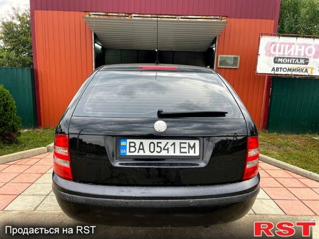 Черный Шкода Фабия, объемом двигателя 1.4 л и пробегом 186 тыс. км за 4100 $, фото 3 на Automoto.ua