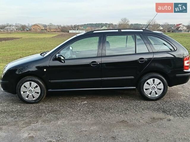Черный Шкода Фабия, объемом двигателя 1.4 л и пробегом 225 тыс. км за 4800 $, фото 33 на Automoto.ua