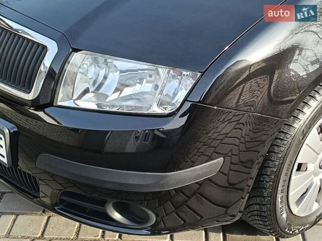 Черный Шкода Фабия, объемом двигателя 1.4 л и пробегом 225 тыс. км за 4800 $, фото 20 на Automoto.ua