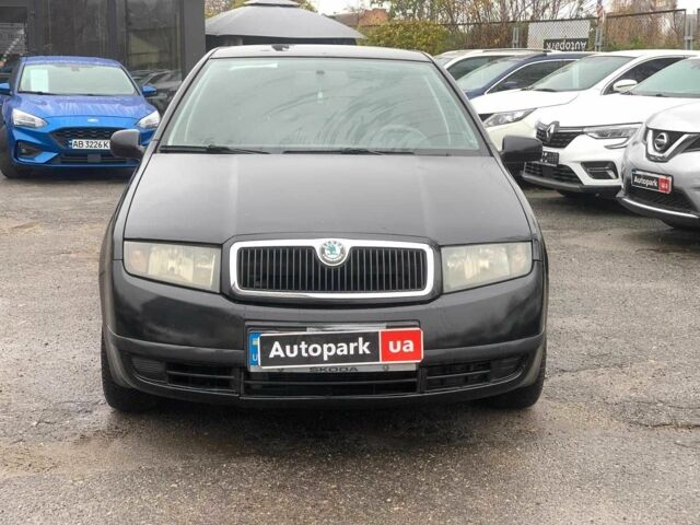 Черный Шкода Фабия, объемом двигателя 1.4 л и пробегом 308 тыс. км за 3390 $, фото 1 на Automoto.ua