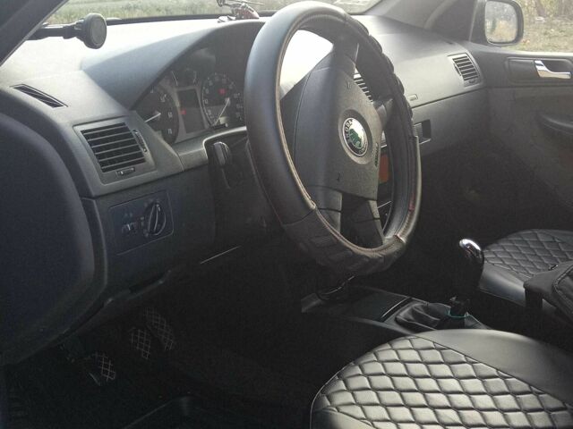 Черный Шкода Фабия, объемом двигателя 1.2 л и пробегом 300 тыс. км за 4350 $, фото 9 на Automoto.ua