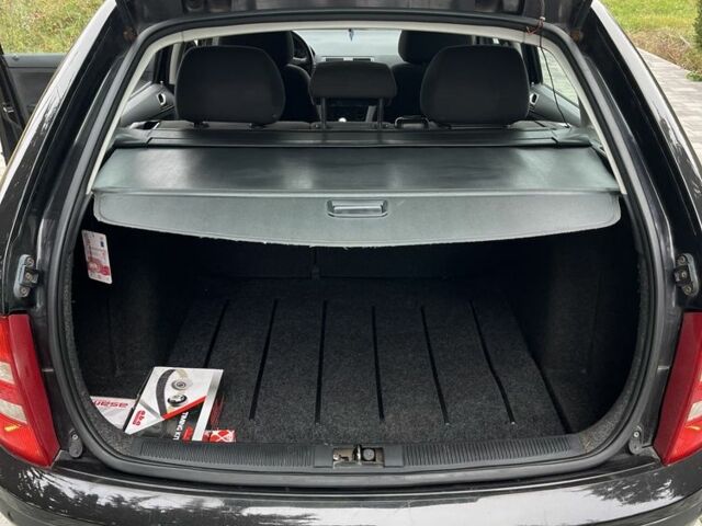 Черный Шкода Фабия, объемом двигателя 1.4 л и пробегом 230 тыс. км за 3999 $, фото 21 на Automoto.ua