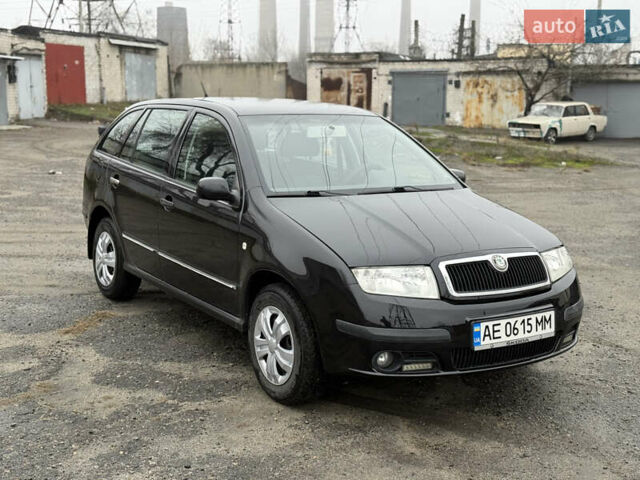 Черный Шкода Фабия, объемом двигателя 1.4 л и пробегом 233 тыс. км за 3800 $, фото 3 на Automoto.ua