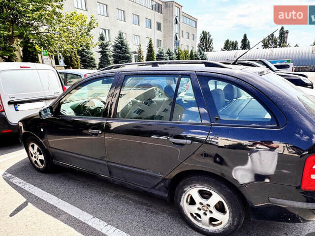 Черный Шкода Фабия, объемом двигателя 1.4 л и пробегом 186 тыс. км за 5000 $, фото 1 на Automoto.ua