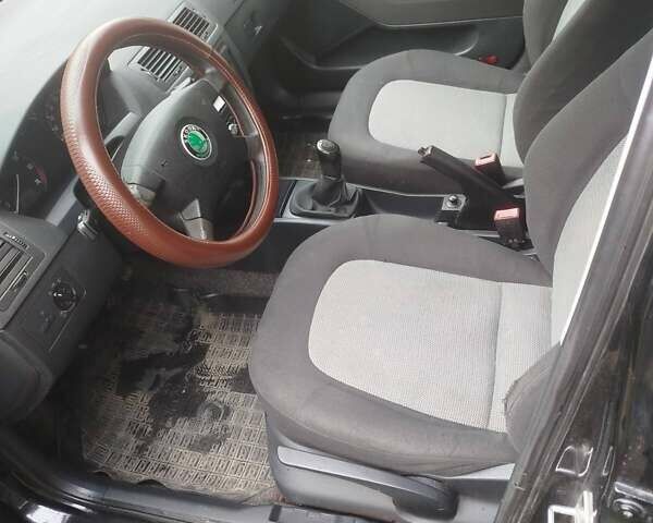 Шкода Фабия 2004 в Виннице на Automoto.ua Черный Шкода Фабия, объемом двигателя 1.39 л и пробегом 308 тыс. км за 3300 $, фото 10 на Automoto.ua