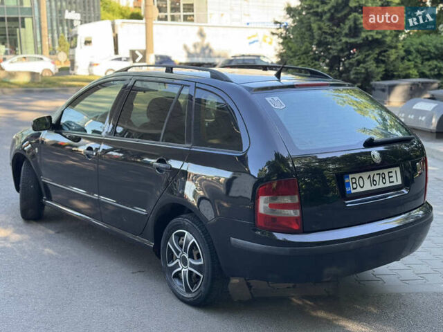 Черный Шкода Фабия, объемом двигателя 1.39 л и пробегом 255 тыс. км за 3750 $, фото 15 на Automoto.ua