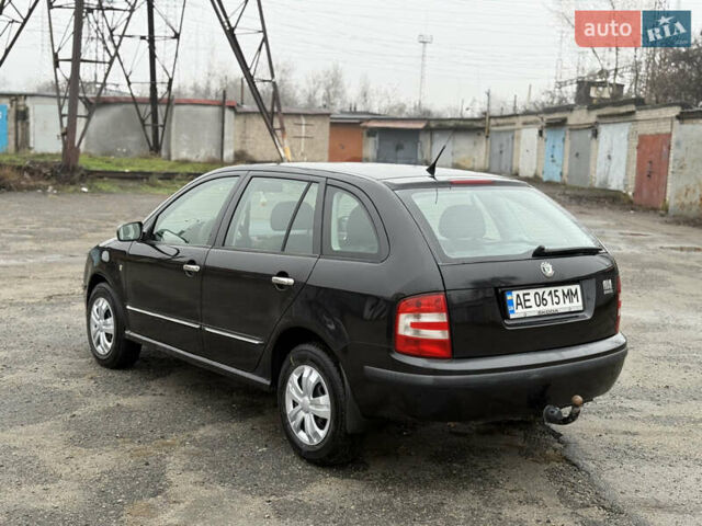 Черный Шкода Фабия, объемом двигателя 1.4 л и пробегом 233 тыс. км за 3800 $, фото 1 на Automoto.ua