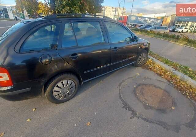 Черный Шкода Фабия, объемом двигателя 1.39 л и пробегом 320 тыс. км за 3899 $, фото 1 на Automoto.ua