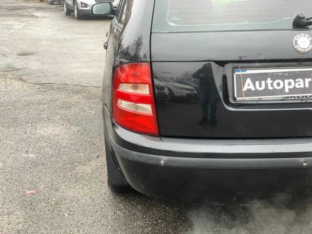 Черный Шкода Фабия, объемом двигателя 1.4 л и пробегом 308 тыс. км за 3390 $, фото 11 на Automoto.ua