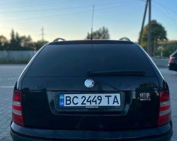 Черный Шкода Фабия, объемом двигателя 1.42 л и пробегом 275 тыс. км за 3800 $, фото 5 на Automoto.ua