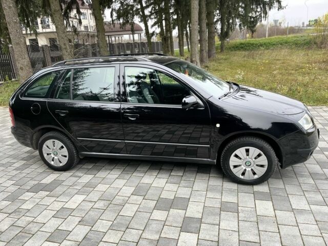Черный Шкода Фабия, объемом двигателя 1.4 л и пробегом 230 тыс. км за 3999 $, фото 5 на Automoto.ua