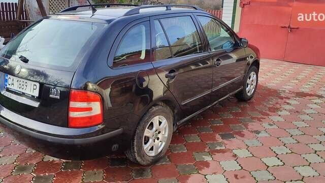 Черный Шкода Фабия, объемом двигателя 1.4 л и пробегом 387 тыс. км за 3500 $, фото 5 на Automoto.ua