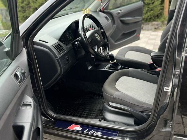 Черный Шкода Фабия, объемом двигателя 1.4 л и пробегом 230 тыс. км за 3999 $, фото 12 на Automoto.ua