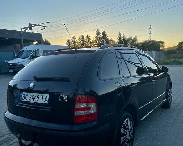 Черный Шкода Фабия, объемом двигателя 1.42 л и пробегом 275 тыс. км за 3800 $, фото 4 на Automoto.ua
