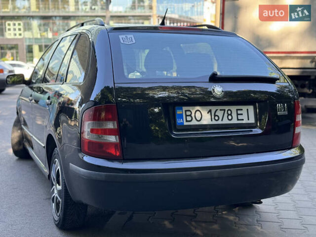 Черный Шкода Фабия, объемом двигателя 1.39 л и пробегом 255 тыс. км за 3750 $, фото 16 на Automoto.ua