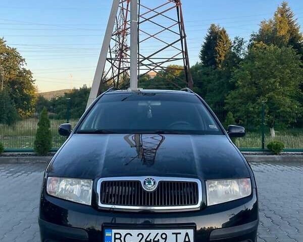 Черный Шкода Фабия, объемом двигателя 1.42 л и пробегом 275 тыс. км за 3800 $, фото 3 на Automoto.ua