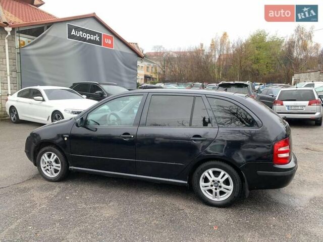 Черный Шкода Фабия, объемом двигателя 1.4 л и пробегом 308 тыс. км за 3390 $, фото 7 на Automoto.ua
