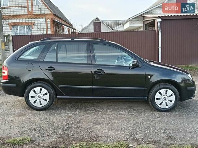 Черный Шкода Фабия, объемом двигателя 1.4 л и пробегом 225 тыс. км за 4800 $, фото 30 на Automoto.ua