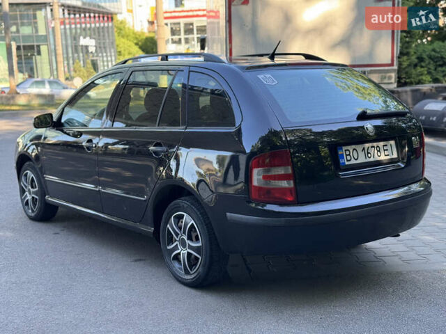 Черный Шкода Фабия, объемом двигателя 1.39 л и пробегом 255 тыс. км за 3750 $, фото 9 на Automoto.ua
