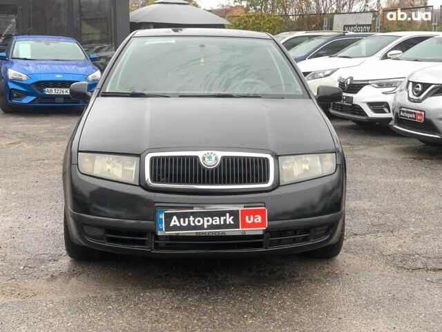 Черный Шкода Фабия, объемом двигателя 1.4 л и пробегом 308 тыс. км за 3390 $, фото 1 на Automoto.ua